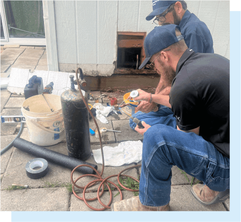 Plumbers working